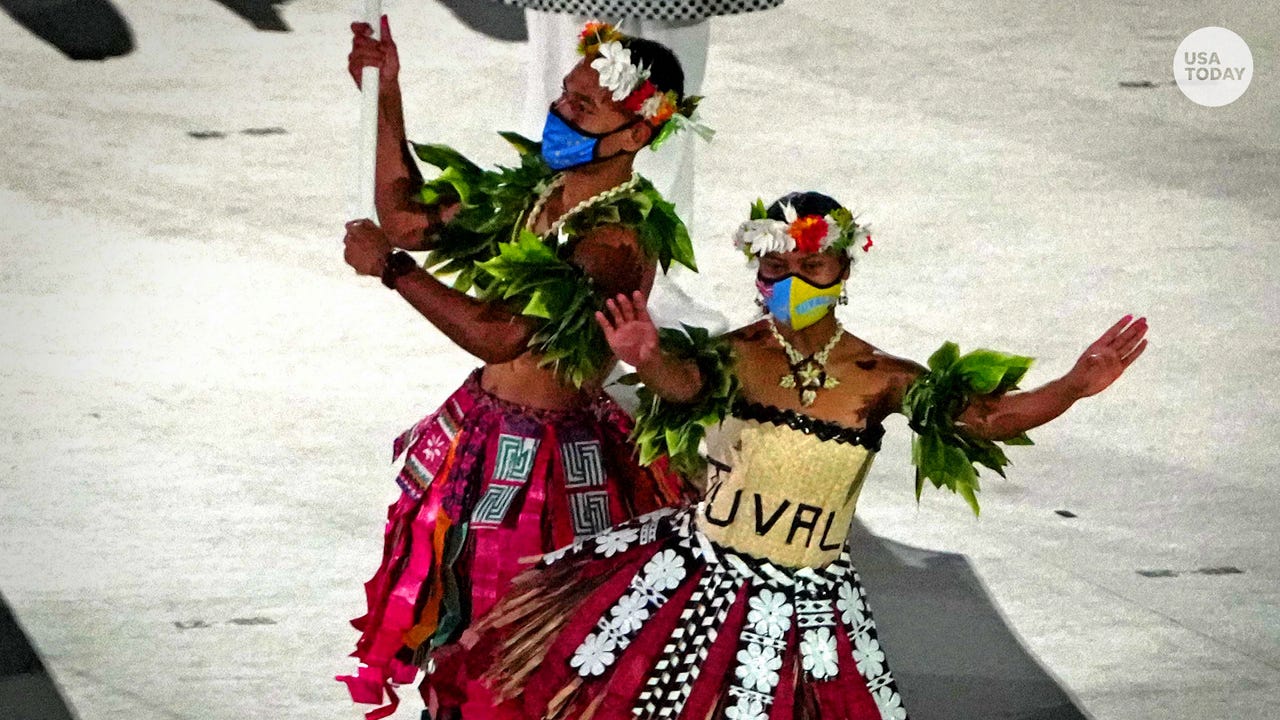Tongan Pita Taufatofua Joined By Riilio Rii As Shirtless Flag Bearers Tongan Pita Taufatofua Joined By Riilio Rii As Shirtless Flag Bearers