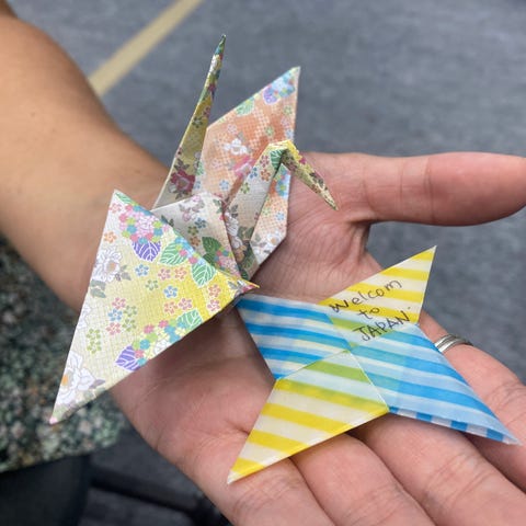 A display of a couple origami gifted from locals i