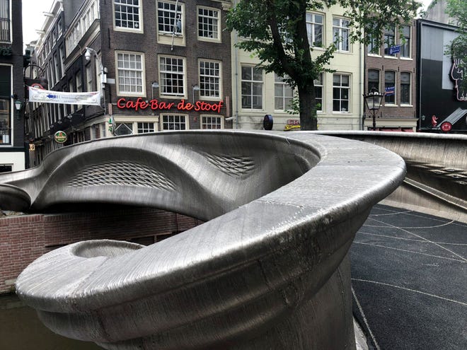 World's first 3D printed bridge opens over canal