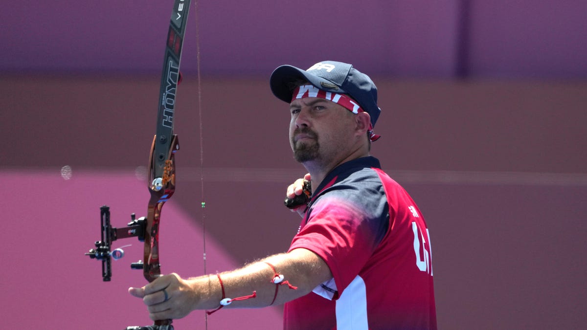 Team USA's Brady Ellison competes in the mixed team elimination round.