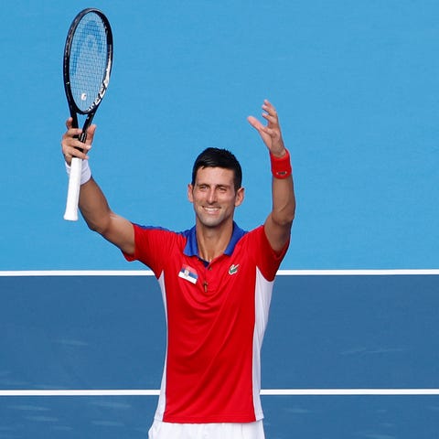 Novak Djokovic celebrates after his match against 