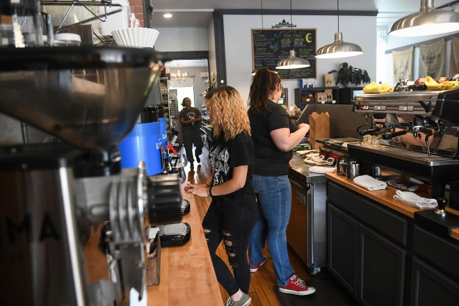 Teen workers at a coffee shop in Pennsylvania in July, 2021.