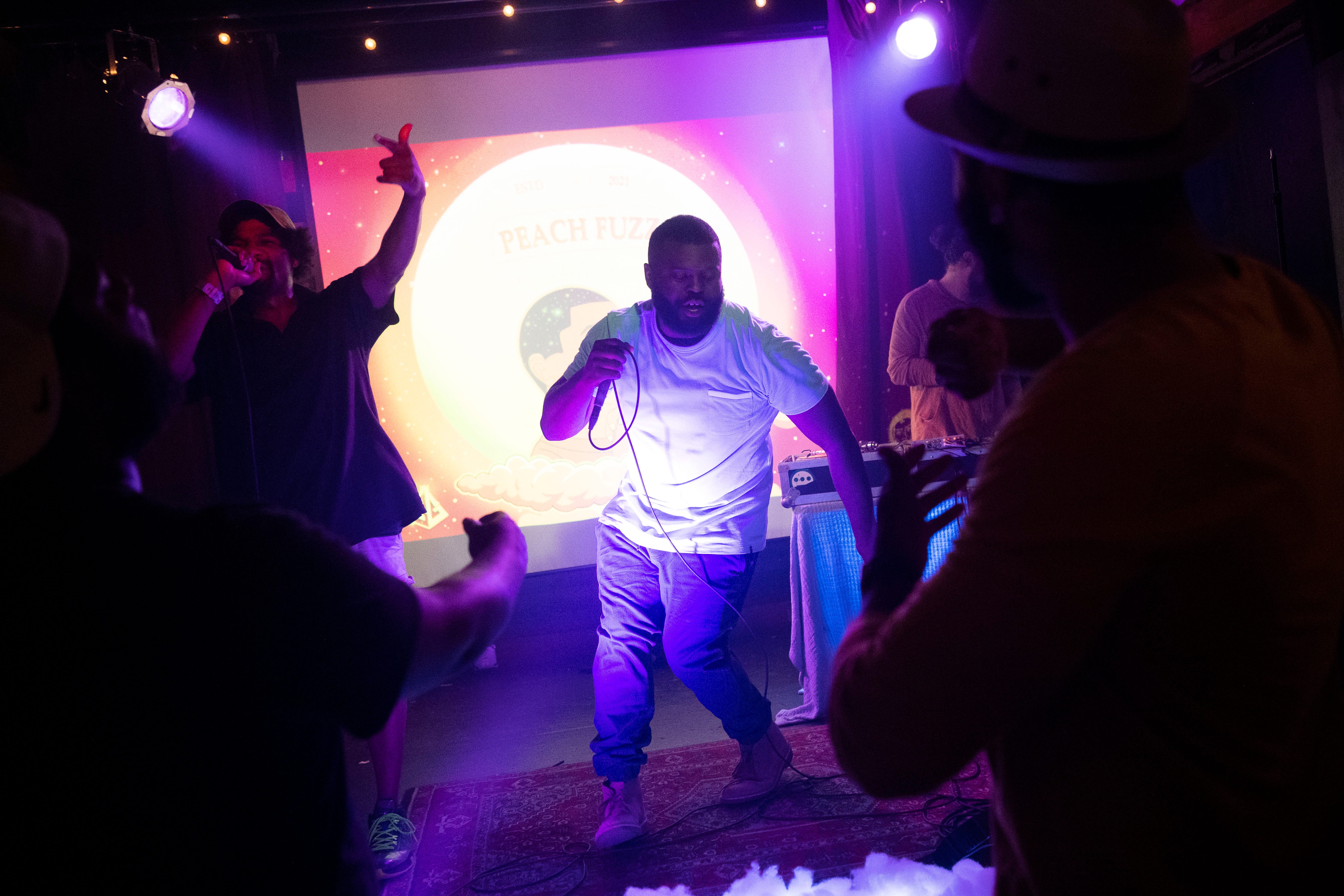 Alongside Colby Earles (left), Jarius Bush performs at The Pilot Light to promote "Peach Fuzz," the first installment in his three-part series of albums about growing up. Hip-hop, however, has been plateauing in Knoxville for years, Earles said, leaving local artists scrambling to find ways to promote their careers and the overall scene.