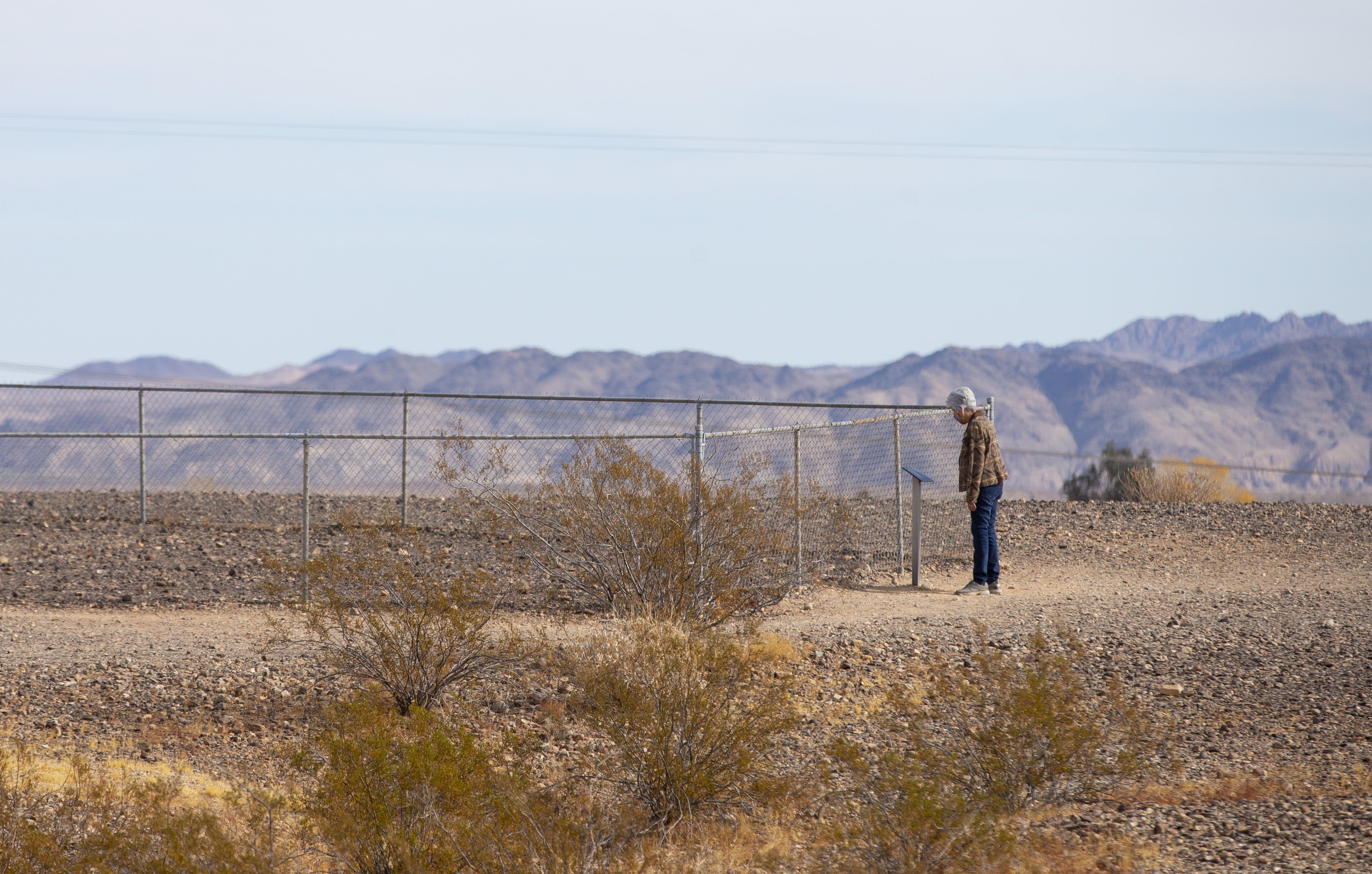 Amelia Flores, Colorado River Indian Tribe chairwoman, looks at a geoglyph at the Blythe Intaglios in California.