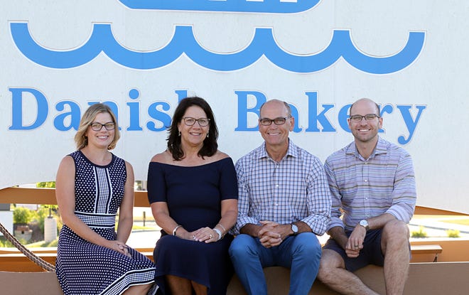 Eric Olesen (right center) is the third generation to run O&H Danish Bakery in Racine. The next generation is helping, too. He's shown with (from left): his daughter Alyson, wife Lisa, Eric, son, Peter.