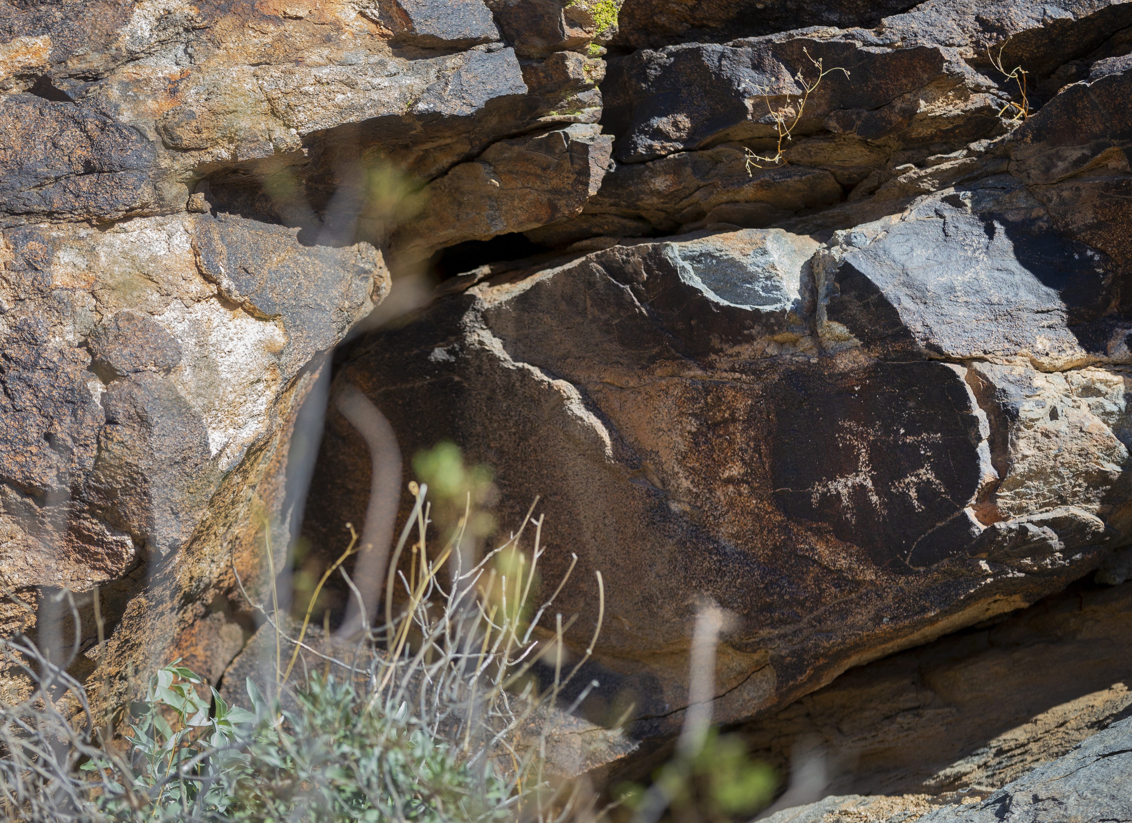 Petroglyphs created by the Huhugam are scattered throughout South Mountain Park in Phoenix. While the land is public, the tribes consider the land to be a sacred site.