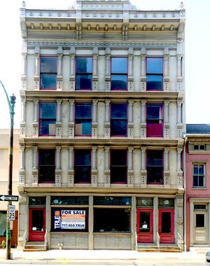 A building which formerly housed Rudy Art Glass and The York Dispatch, at 15 E. Philadelphia St. in York City, Tuesday, July 27, 2021, is for sale. Bill Kalina photo