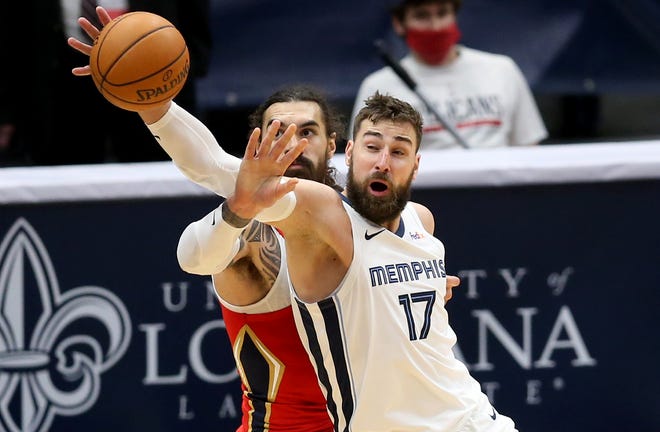 Memphis is trading Jonas Valanciunas (17) to New Orleans in deal that includes Steven Adams (12).
