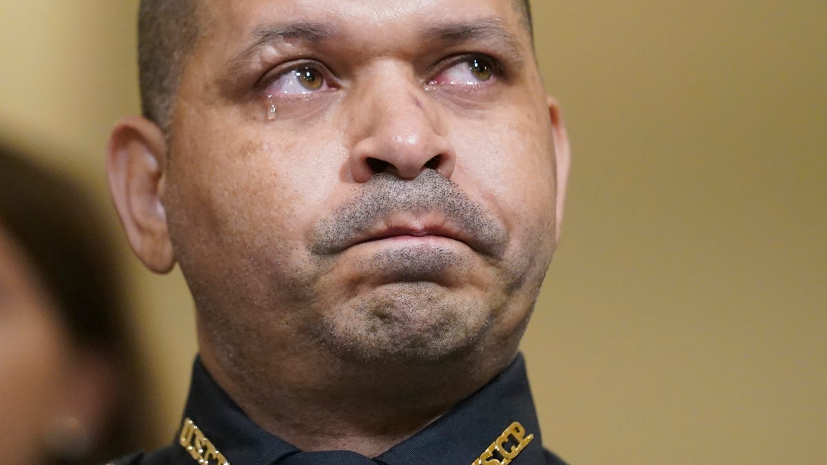July 27, 2021: U.S. Capitol Police officer Aquilino Gonell cries as he watches a video during the House select committee hearing on the Jan. 6 attack on Capitol Hill in Washington.