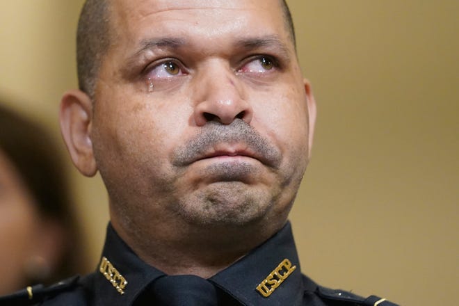 July 27, 2021: U.S. Capitol Police officer Aquilino Gonell cries as he watches a video during the House select committee hearing on the Jan. 6 attack on Capitol Hill in Washington.