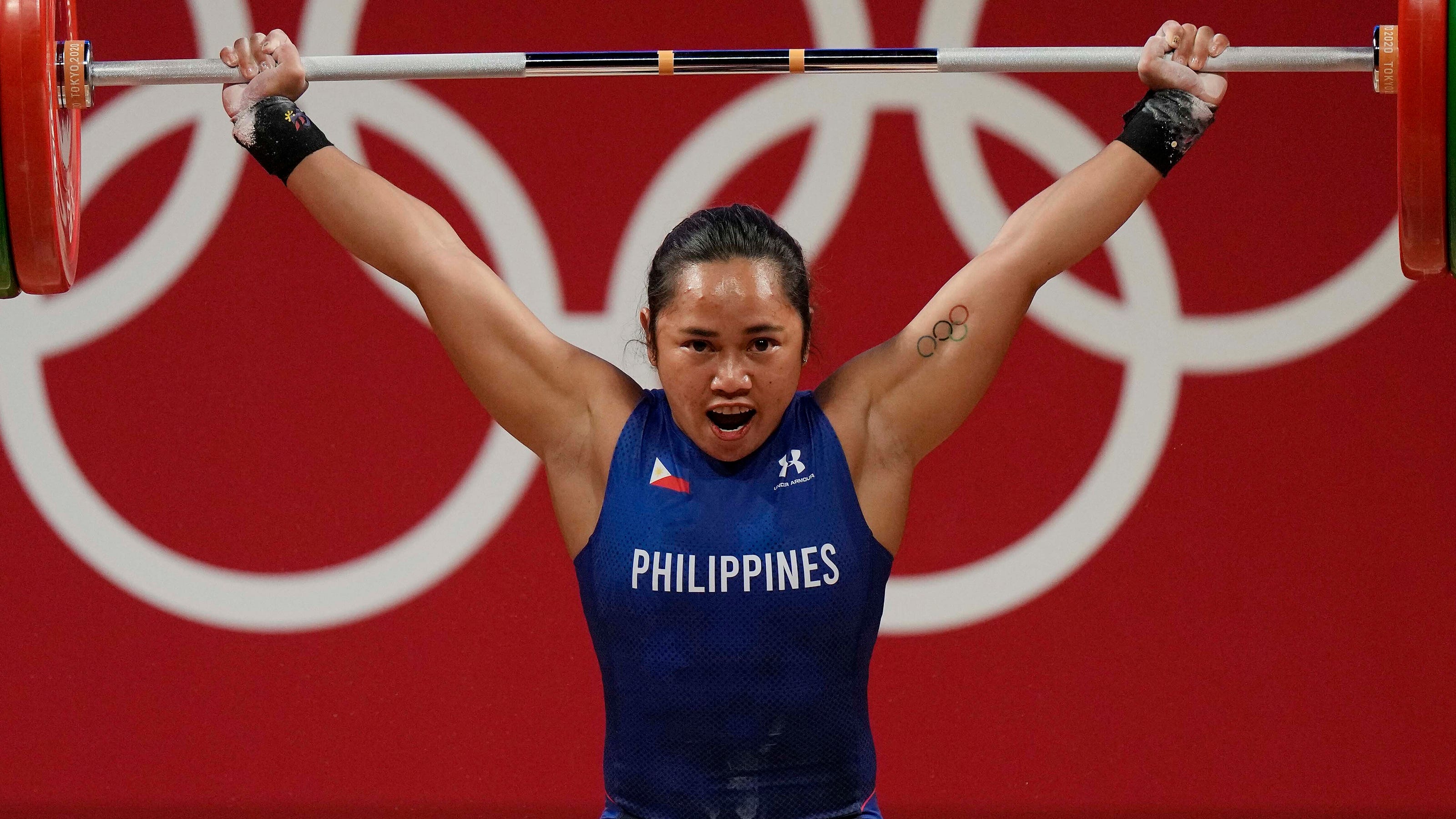 Philippines weightlifter Diaz wins Tokyo Olympic gold medal, 2 houses