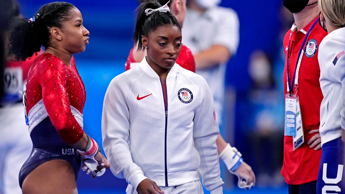 Simone Biles (USA) wears her warm up gear after competing on the vault during the Tokyo Olympics.