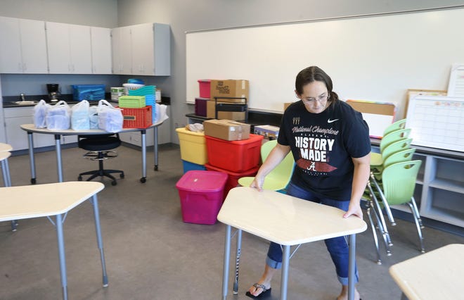 Whitney Wahl sets up her sixth grade special education classroom in the new Northport Intermediate School Friday, July 23, 2021. [Staff Photo/Gary Cosby Jr.]