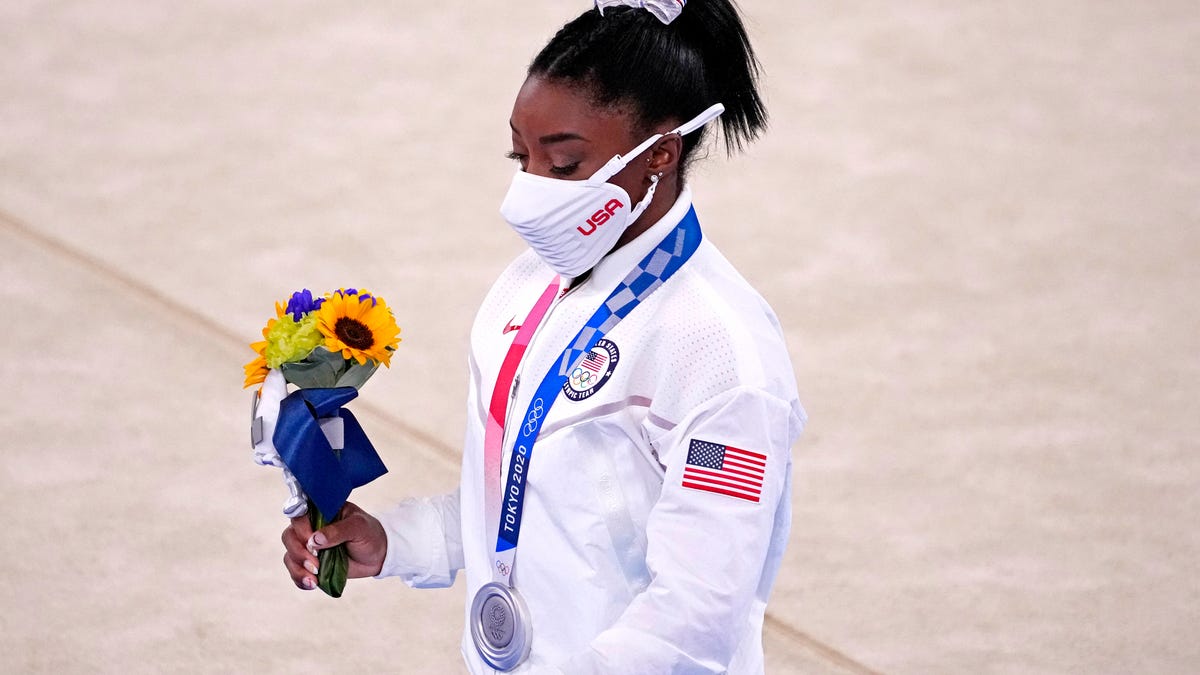 Simone Biles received her gold medal after Tuesday's team final. Russia took gold.