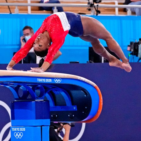 Simone Biles competes on the vault before withdraw