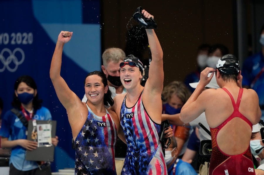 Katie Ledecky (USA), right, and Erica Sullivan (USA) celebrate after placing first and second in the women's 1500m freestyle final during the Tokyo 2020 Olympic Summer Games at Tokyo Aquatics Centre on Jul 28, 2021.