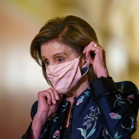 Speaker of the House Nancy Pelosi, D-Calif., wears