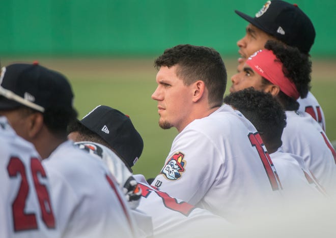 Chandler Redmond watches the action from the dugout with his Peoria Chiefs teammates as they battle Beloit on Wednesday, July 28, 2021 at Dozer Park.