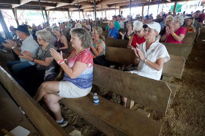 With this being an off-election year, crowds attending the political speeches were smaller usual at the Neshoba County Fair in Philadelphia, Miss., Thursday, July 29, 2021. The fair, also known as Mississippi's Giant House Party, is an annual event of agricultural, political, and social entertainment at what might be the country's largest campground fair. (AP Photo/Rogelio V. Solis)