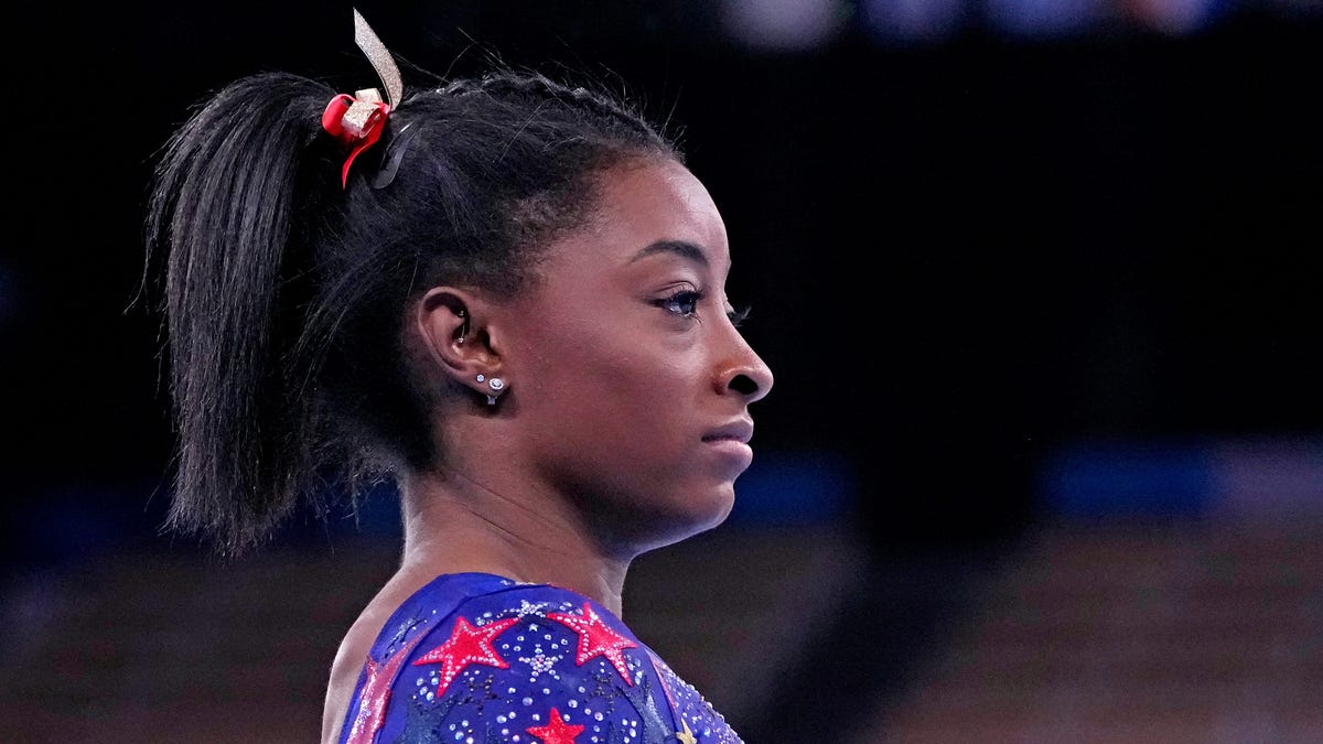"We have to protect our mind and our body rather than just go out there and do what the world wants us to do," Simone Biles said.