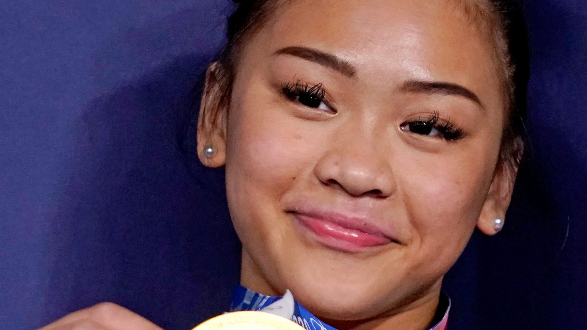 Sunisa Lee (USA) poses with her gold medal after winning the women's gymnastics individual all-around final during the Tokyo 2020 Olympic Summer Games at Ariake Gymnastics Centre.