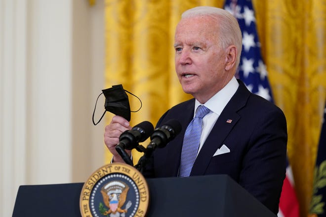 President Joe Biden urges people to get vaccinated and wear masks.