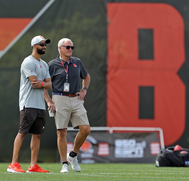 Cleveland Browns GM Andrew Berry and owner Jimmy Haslam watch from the sideline during NFL football training camp, Friday, July 30, 2021, in Berea, Ohio.