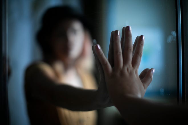 Orion Hower, 19, who is nonbinary and uses they/them pronouns, personally experienced barriers to mental health care in Ohio. He was photographed at a home in the Clintonville neighborhood of Columbus on Friday, July 30, 2021.