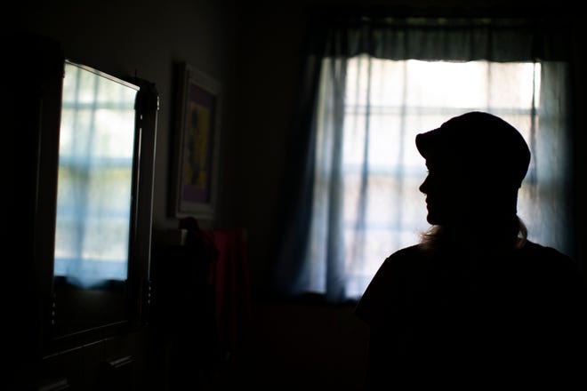 Orion Hower, 19, who is nonbinary and uses they/them pronouns, personally experienced barriers to mental health care in Ohio. He was photographed at a home in the Clintonville neighborhood of Columbus on Friday, July 30, 2021.