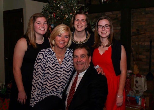 Janie Klare (center left) with her husband Bob Klare and daughters Alexandra, Lauren and Abigail.