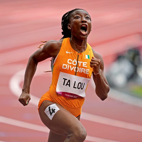 Marie-Josee Ta Lou of the Ivory Coast reacts after