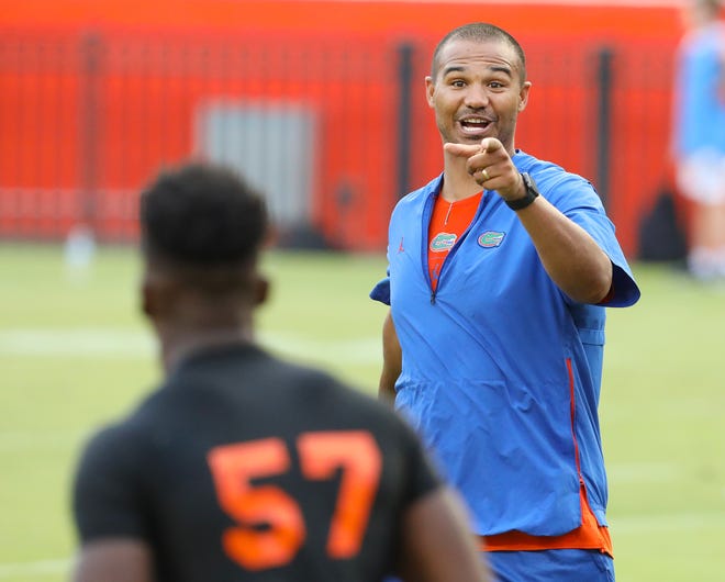 Florida linebackers coach Christian Robinson teaches his unit more than Xs and Os.