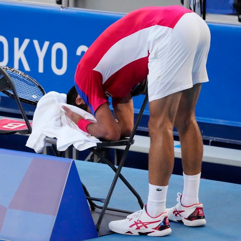 Novak Djokovic reacts during the third set against