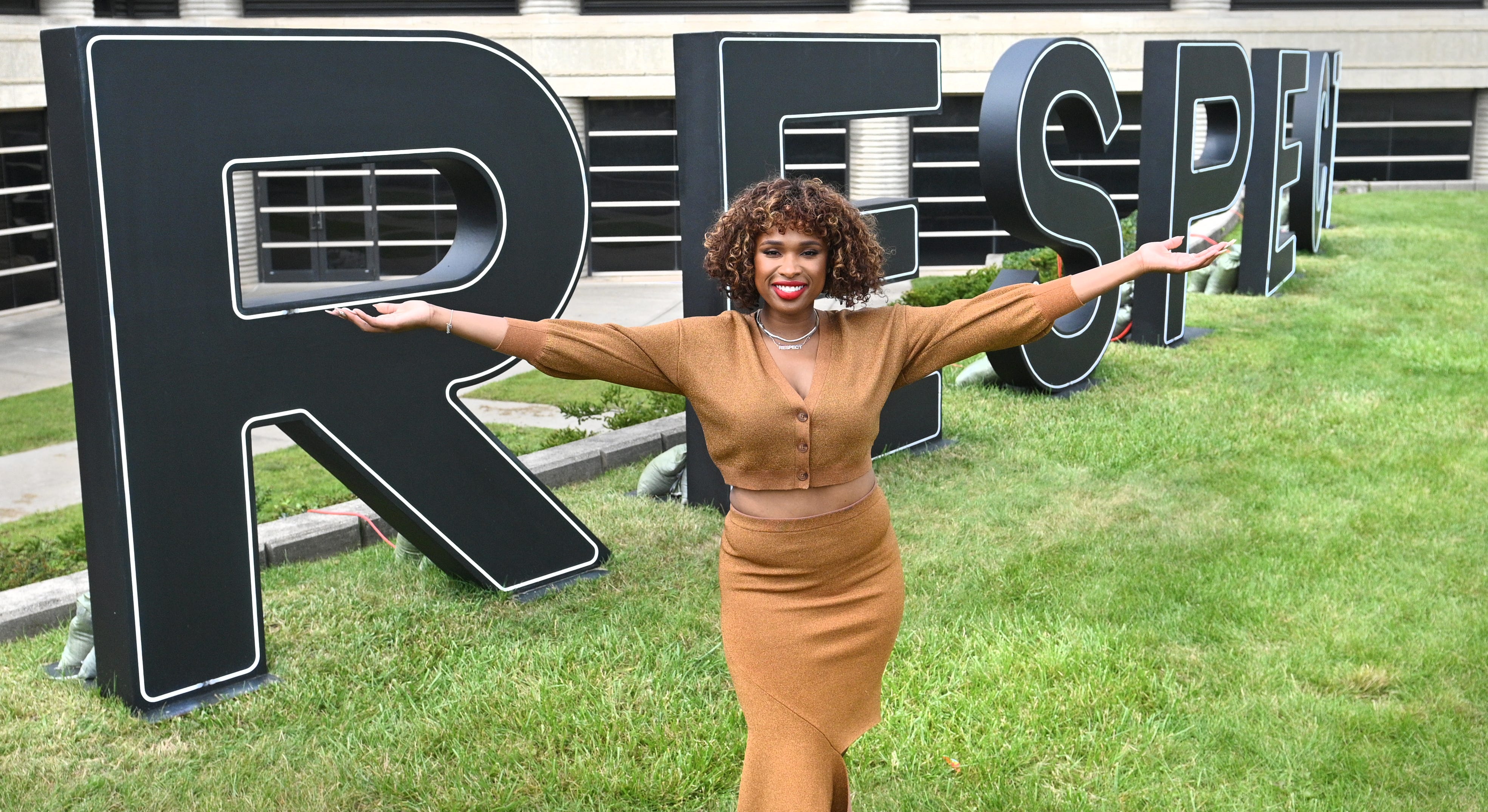 Jennifer Hudson poses outside the Charles Wright Museum's light-up RESPECT letters in Detroit on Sunday during a conversation on the film "Respect," in which Hudson plays Aretha Franklin.