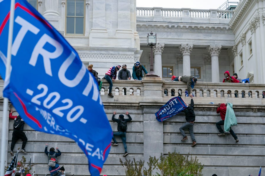 Trump supporters climb the U.S. Capitol on Jan. 6, 2021.