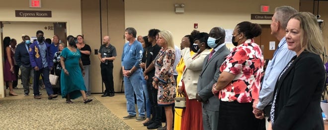 Some of the administrators appointed to new positions over the summer lined up to be acknowledged during the July 27 Polk County School Board meeting. School begins Aug. 10.
