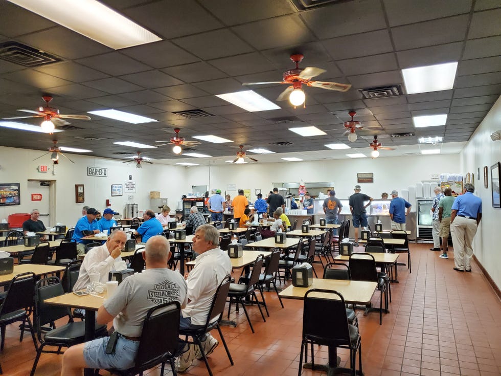Customers trickle into the dining room just before the lunch-hour crush at Kinlaw's Welcome Grill.