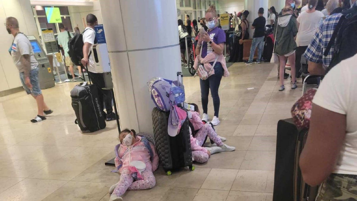 Spirit Airlines passengers waited in long lines at Orlando International Airport before dawn Monday morning after a flurry of Sunday flight cancellations.