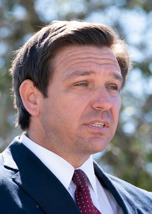 Florida Governor Ron DeSantis speaks during a press conference at a COVID-19 vaccination site at Anquan Boldin Stadium in Pahokee, Florida on February 3, 2021. GREG LOVETT/PALMBEACHPOST
