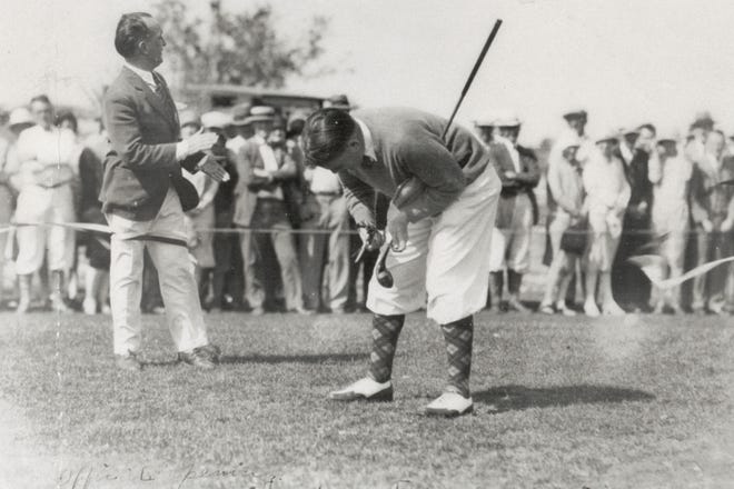 Bobby Jones cuts the ribbon to open the Bobby Jones Municipal Course, in Sarasota, on Feb. 13, 1927.