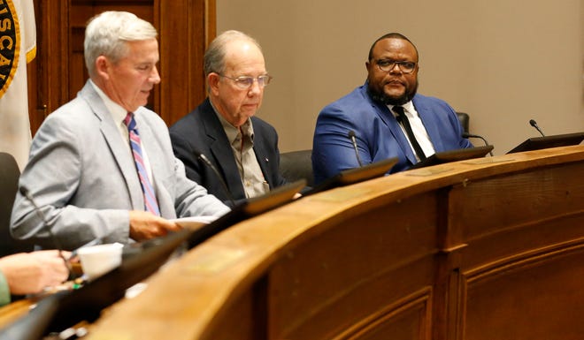 District 4 Councilman Lee Busby, far left, was joined by his fellow councilors, including freshman council members John Faile, center, and Cassius Lanier, right, in unanimously adopting the city of Tuscaloosa's fiscal 2022 operating budget. “We’re very happy with it," Busby said. "It was a lot of work."