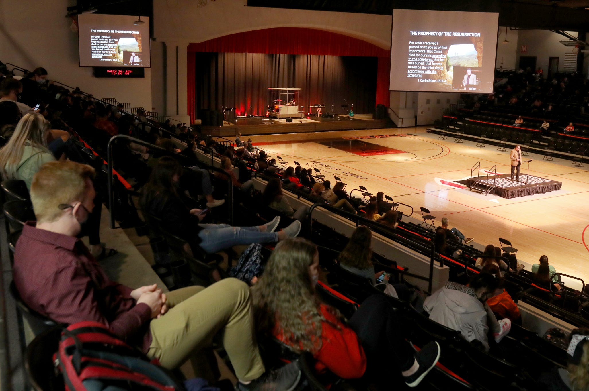 Students listen to Dr. Tiberius Rata, the associate dean at the School of Ministry Studies at Grace College and Seminary preach during chapel service inside the Manahan Orthopaedic Capital Center on the campus in Winona Lake, Indiana on Tuesday, March 30, 2021.
