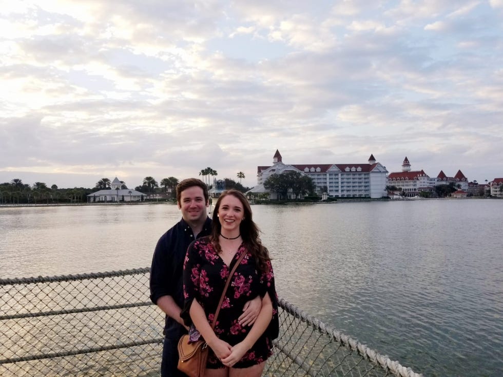 Josh Atkinson of England and Alexis Olson of Minnesota pose during their first date at Disney World in February 2019.