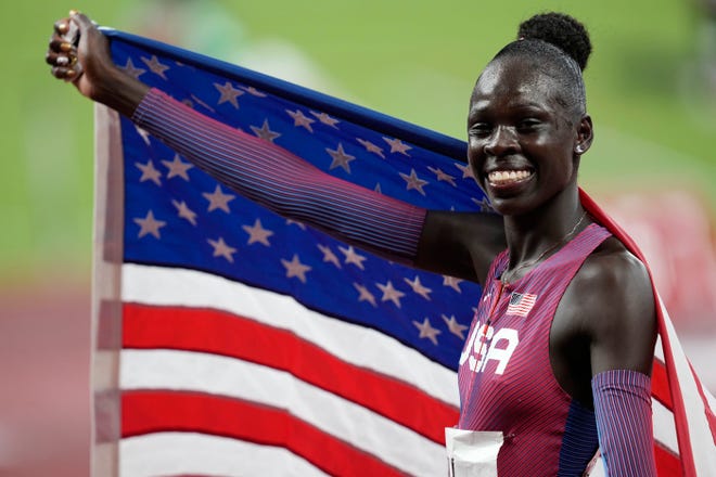 Team USA's Athing Mu reacts after winning the gold medal in the 800 meters in Tokyo.