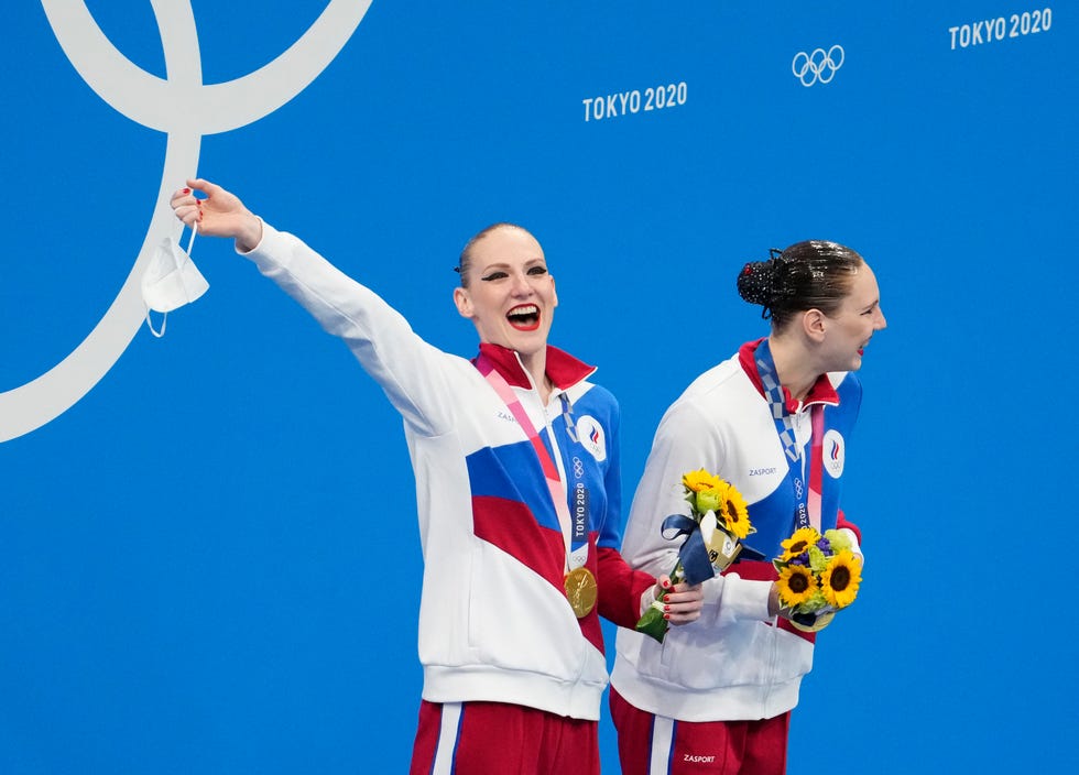 Svetlana Kolesnichenko and Svetlana Romashina (ROC) celebrate their gold medal on Wednesday August 4, 2021, after the women's artistic swimming duo final during the Tokyo 2020 Summer Olympics at the Tokyo Aquatic Center.