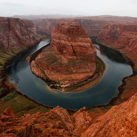The Colorado River wraps around Horseshoe Bend in 