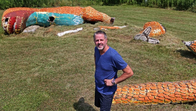 Four years after buying the iconic Johnson's Park dinosaur statue, its owner, Chad Covert has plans to restore and prop up the 16-foot figure that weighs 13,000 pounds in the backyard of his Saukville home.