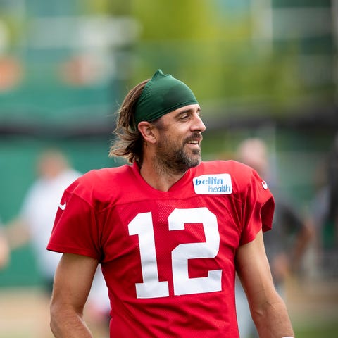 Green Bay Packers quarterback Aaron Rodgers partic