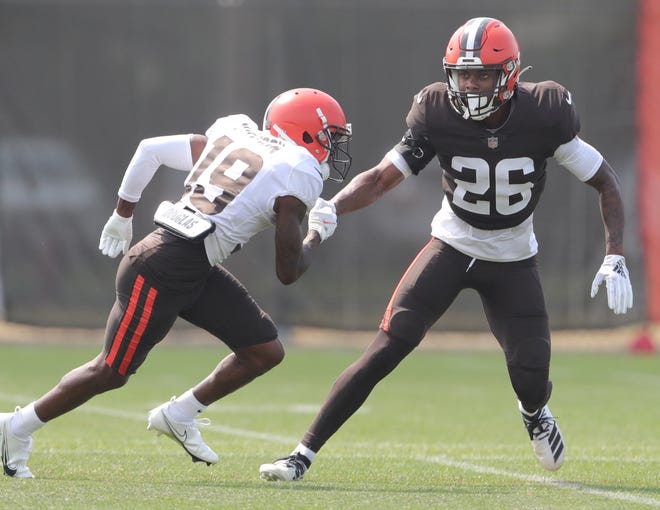 Browns receiver JoJo Natson is covered by cornerback Greedy Williams during practice on Tuesday, August 3, 2021 in Berea, Ohio, at CrossCountry Mortgage Campus. [Phil Masturzo/ Beacon Journal]