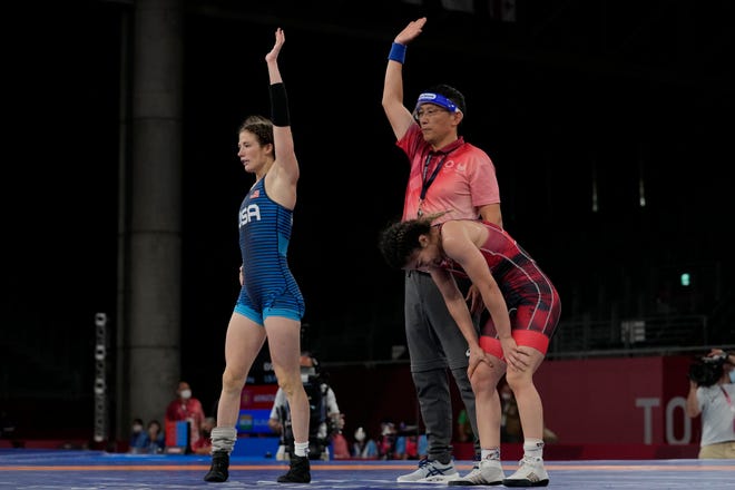 Granger native Sarah Hildebrandt of the USA, left, reacts after defeating Turkey's Evin Demirhan during their first round women's freestyle 50k wrestling match at the 2020 Summer Olympics, Friday, Aug. 6, 2021, in Chiba, Japan.